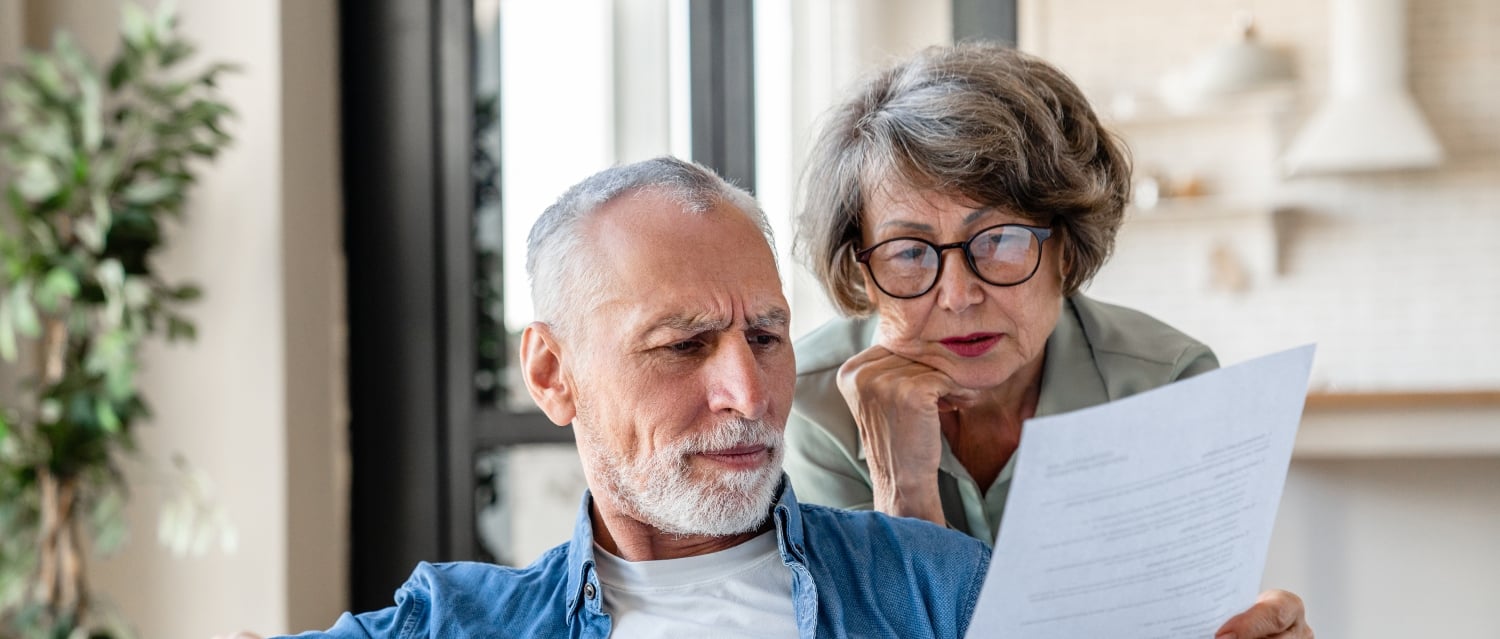 Senior couple S1 form 2411088911 Couple looking at a form