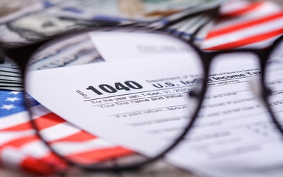 What taxes do US citizens pay on overseas property?